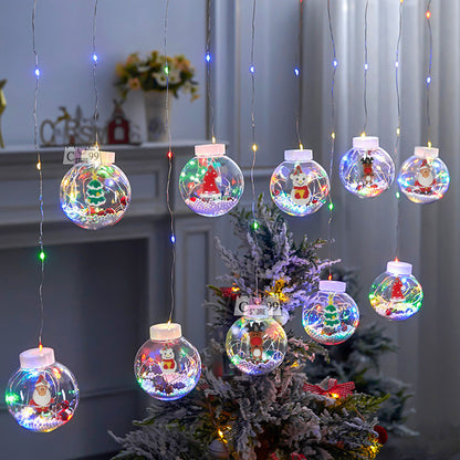Instalación Bolas Con Figuras Navideñas